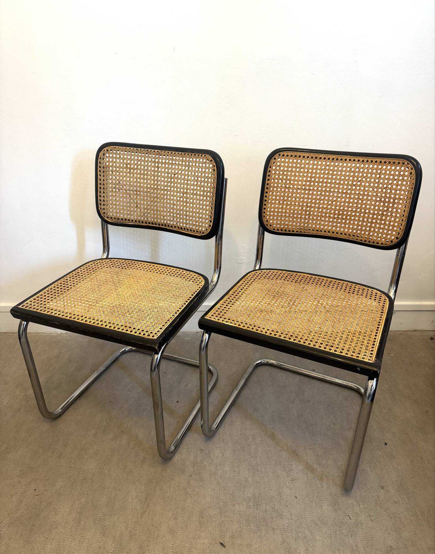 Pair of Marcel Breuer B32 Cesca chairs made in Italy.