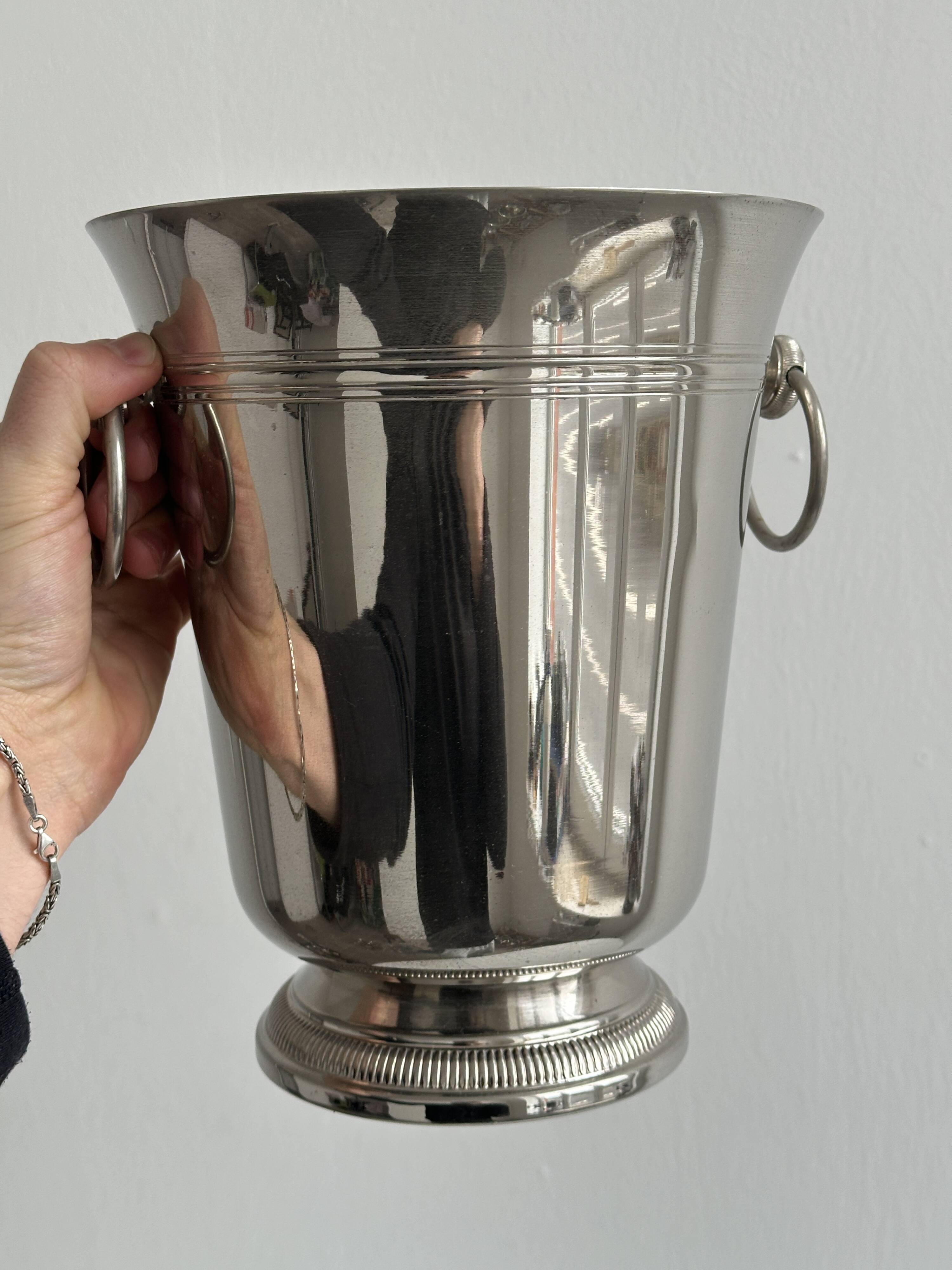 Shiny metal champagne bucket