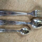 Old housewife in silver metal