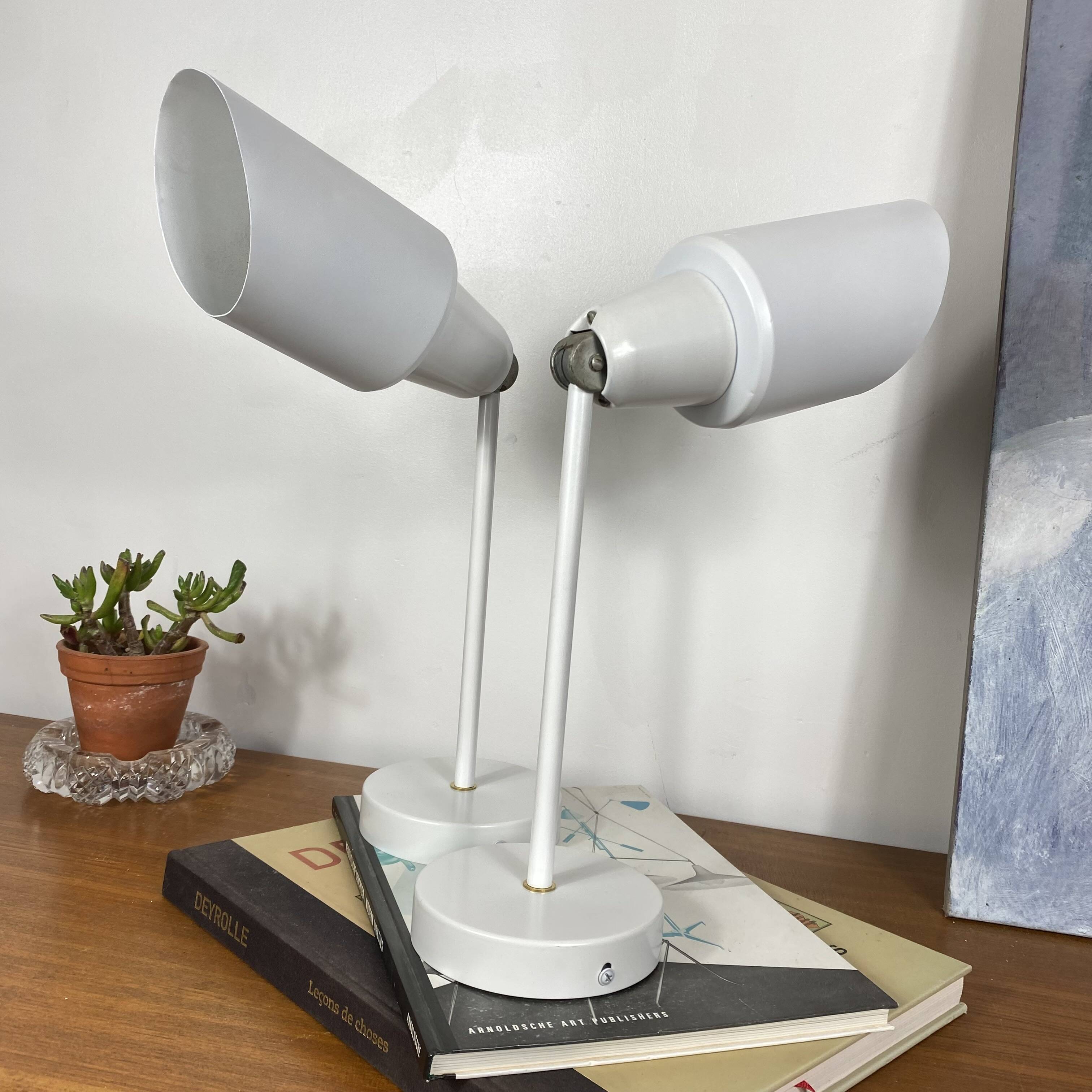 Pair of old industrial adjustable wall sconces in white metal.