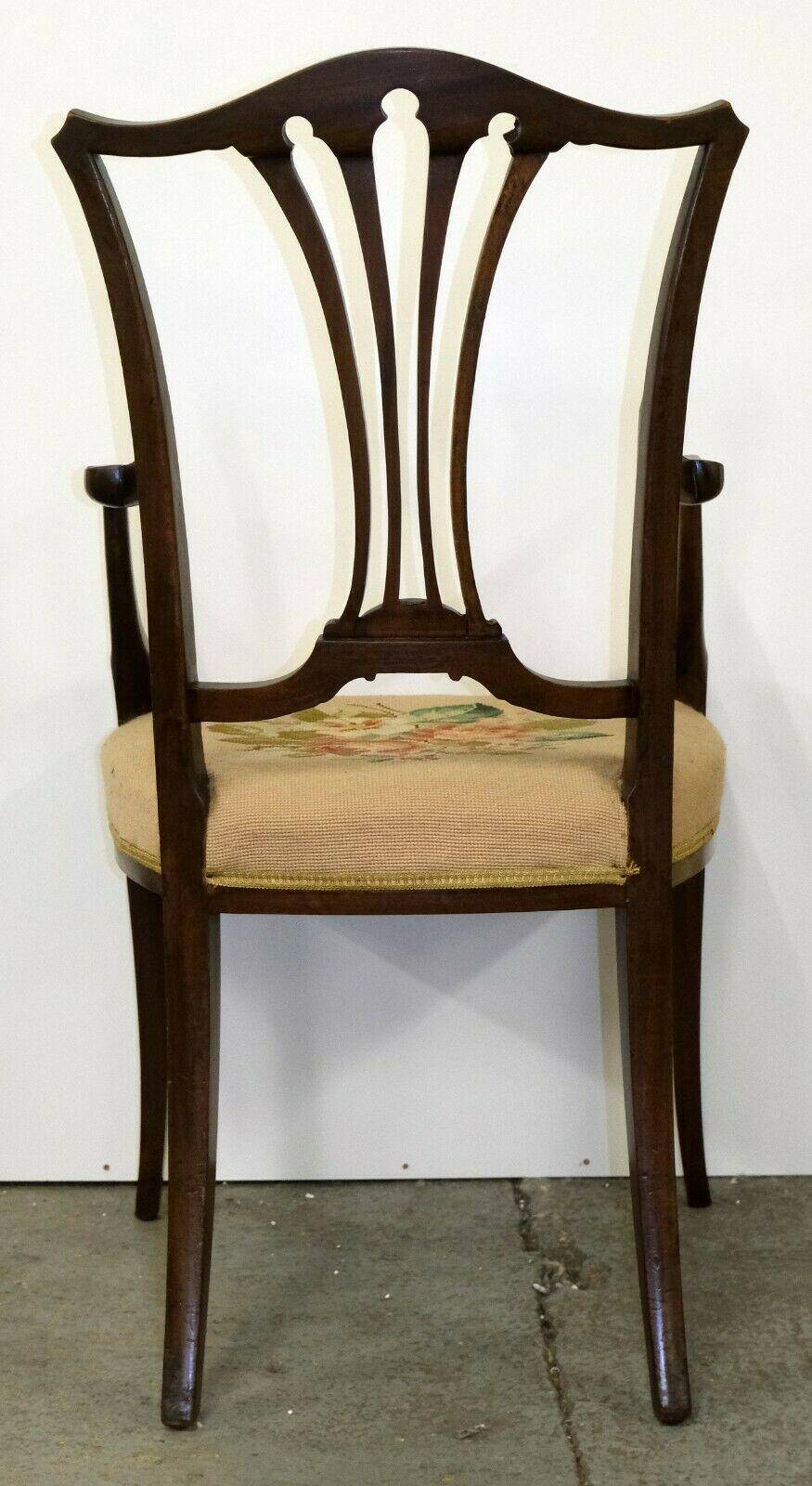 Hepplewhite armchair in hardwood on delicate legs with original seat.