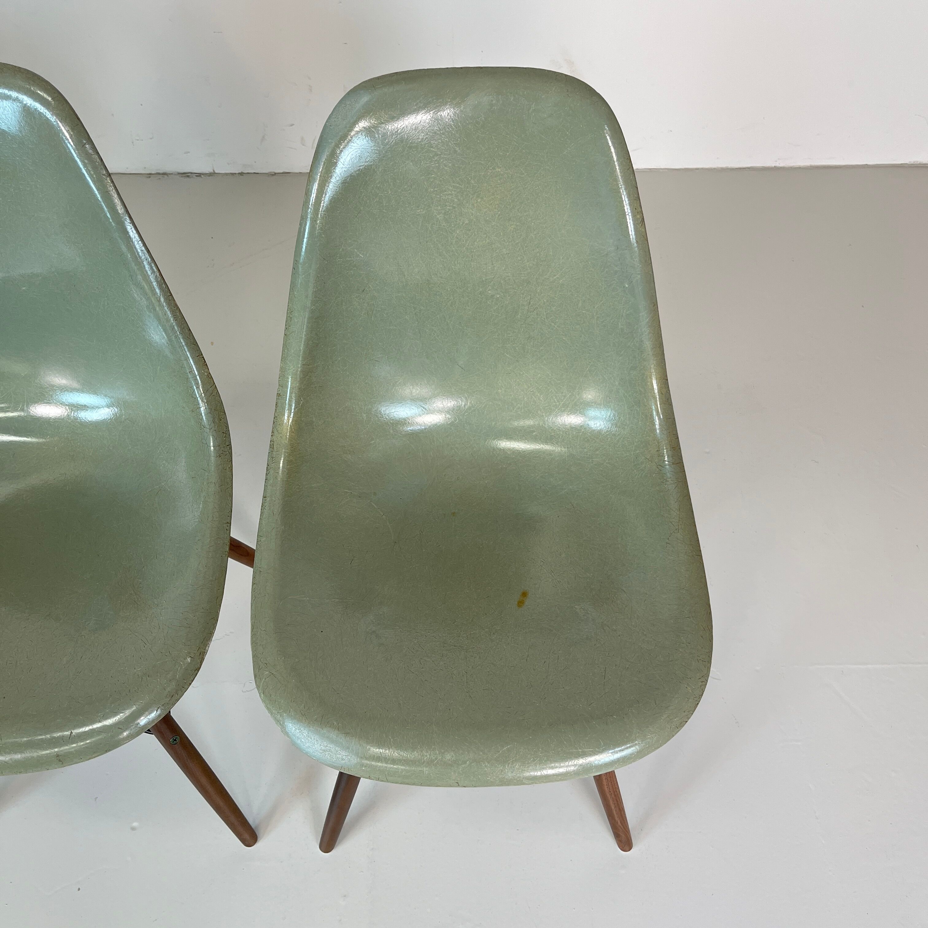 Eames Herman Miller DSW side chairs in seafoam green with imperfections