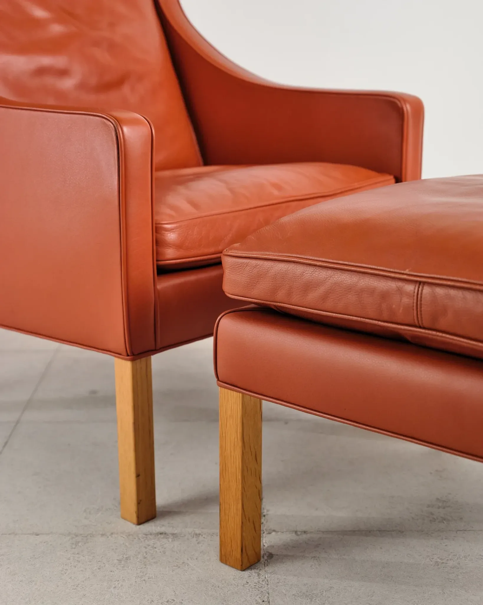 Armchair 2204 and leather pouf by Børge Mogensen, Denmark, 1960s.