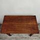 Antique wooden desk with a drawer.
