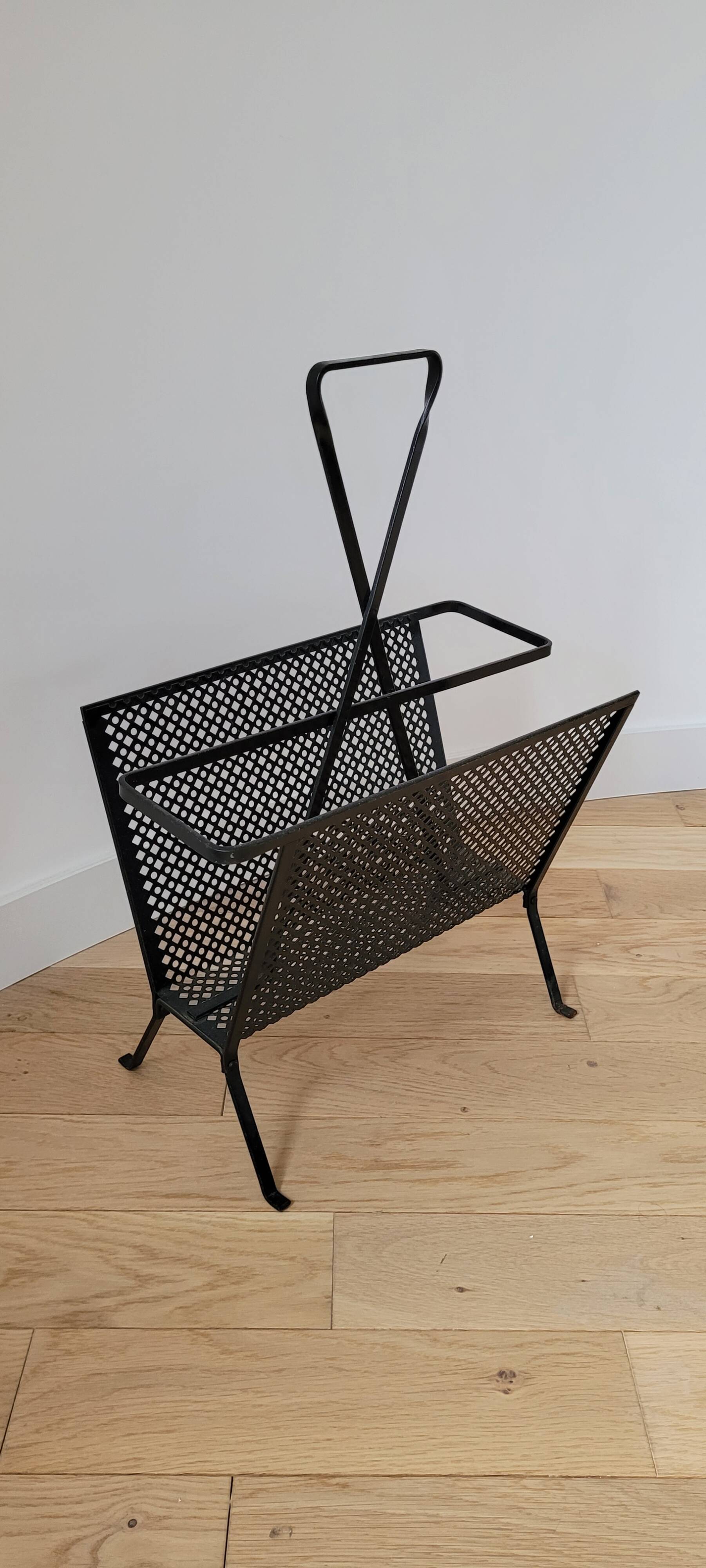 Magazine rack by Mathieu Mategot