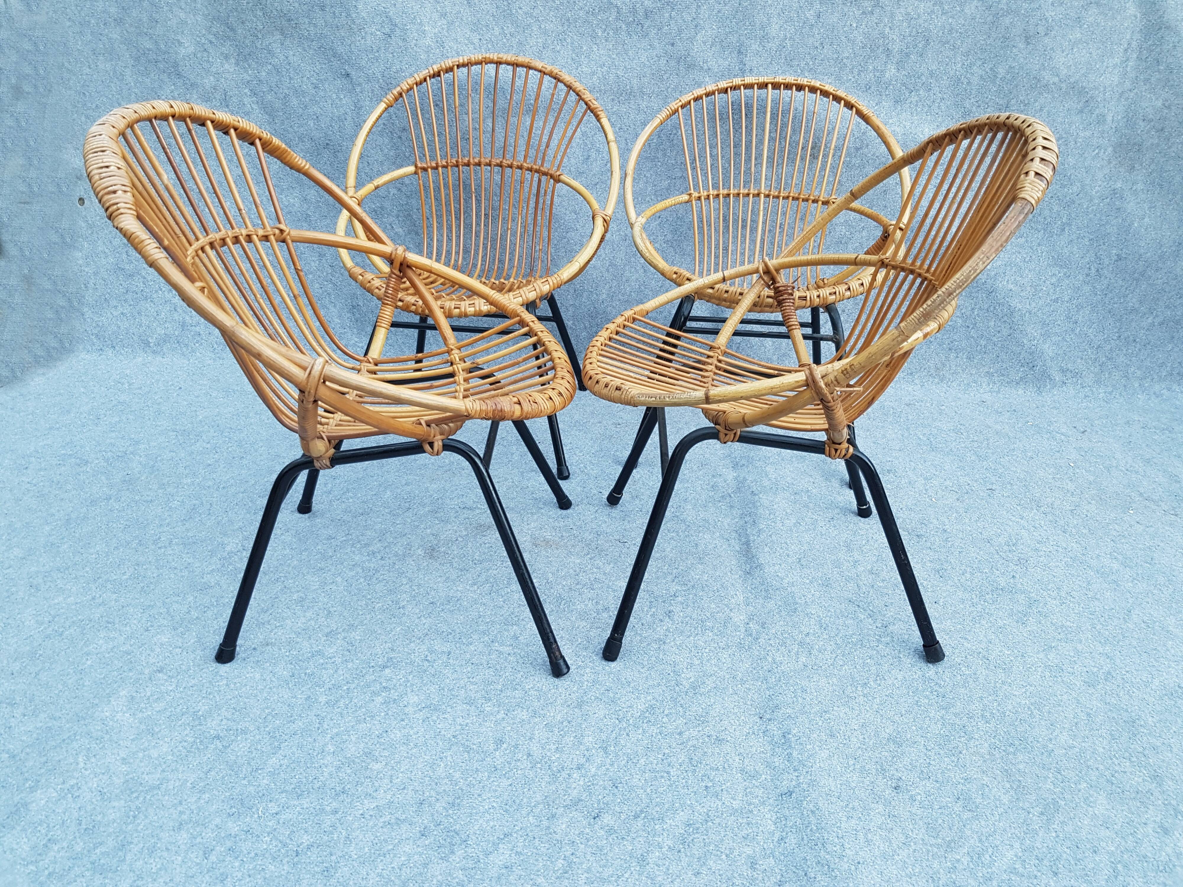 4 shell armchairs in rattan, metal feet