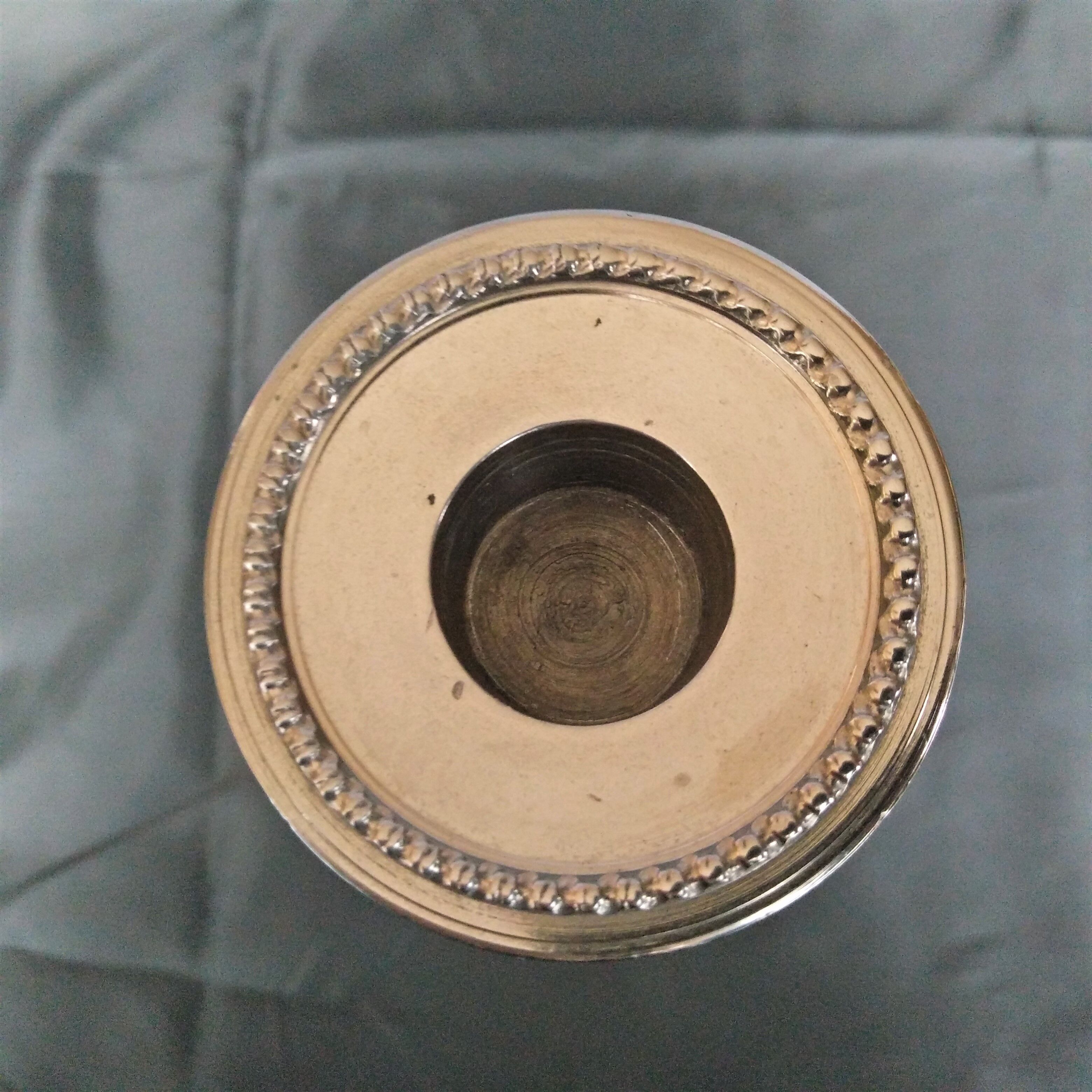Chromed metal candle holder