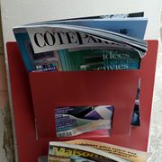 Vintage red metal wall magazine rack