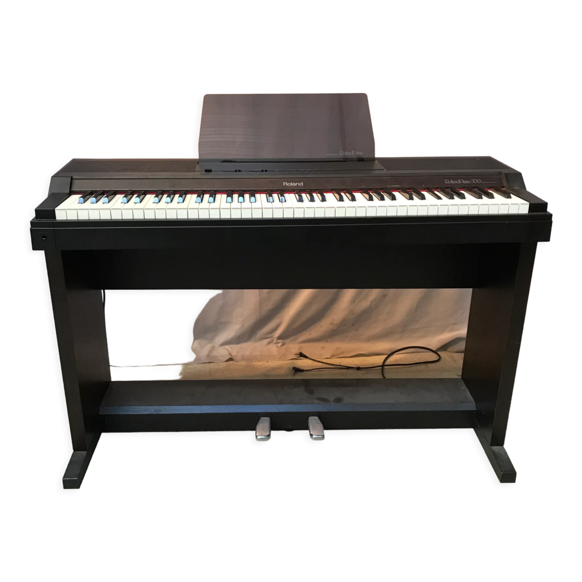 Roland HP 700 keyboard and its stand with pedal