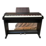 Roland HP 700 keyboard and its stand with pedal