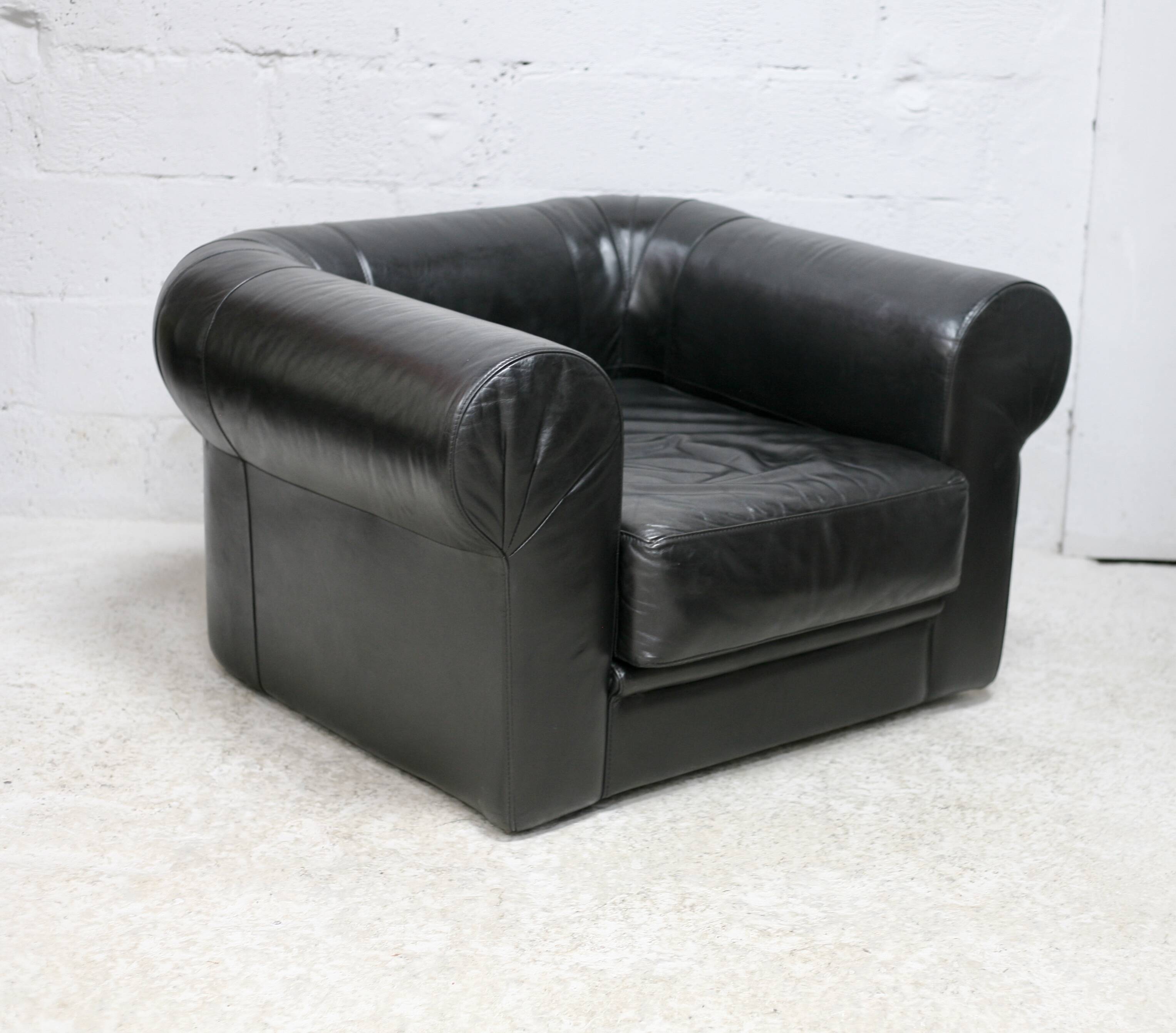 Large black leather armchair, France, 1980s