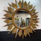 Golden sunburst mirror with wooden rays - 1950s