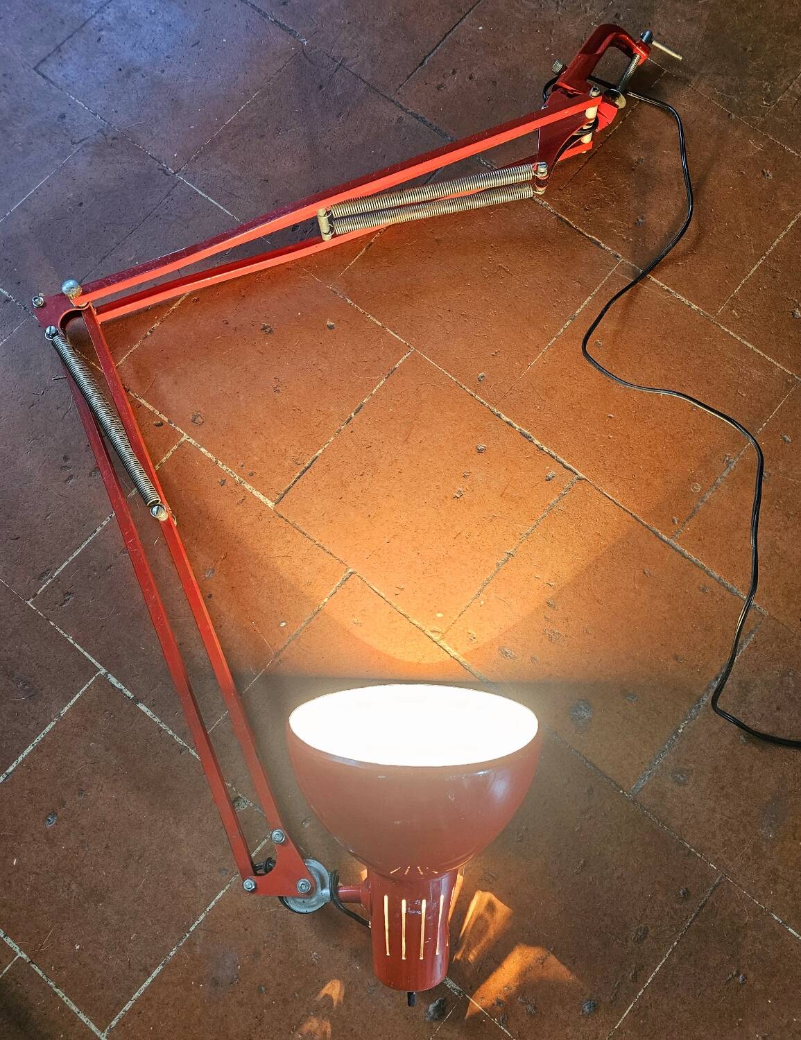 Red articulated workshop lamp