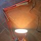 Red articulated workshop lamp