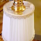 Stroller with pleated fabric lampshade