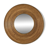 Large round mirror in rattan and brass