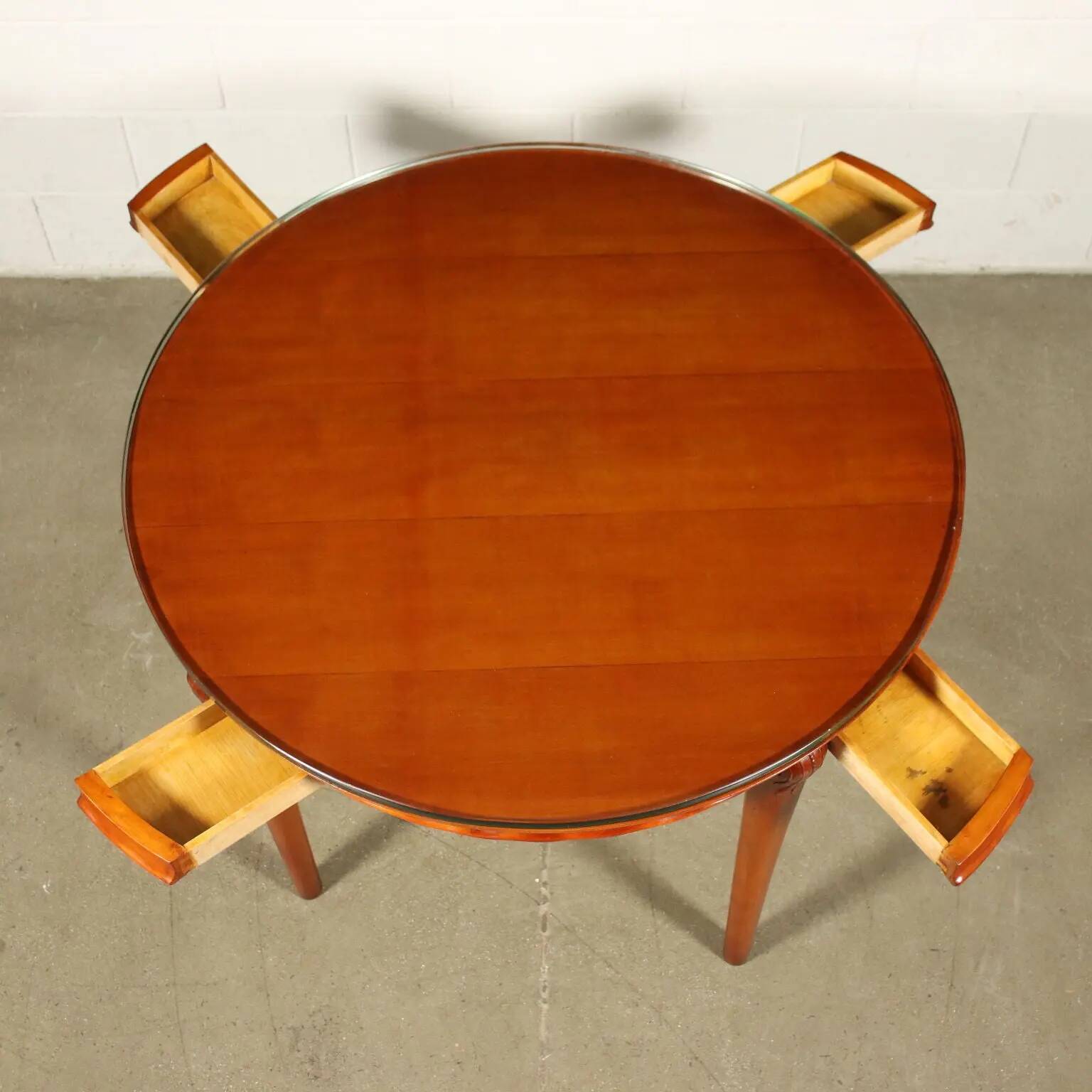 Table in solid beech, mahogany veneer and glass, Italy, 1950s.