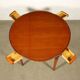 Table in solid beech, mahogany veneer and glass, Italy, 1950s.