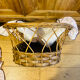 1960s wicker cradle with mattress and drapes.