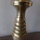 Old candle holder in gilded bronze