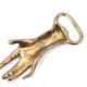 Brass hand bottle opener, 50s