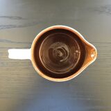 Signed pitcher with floral decoration