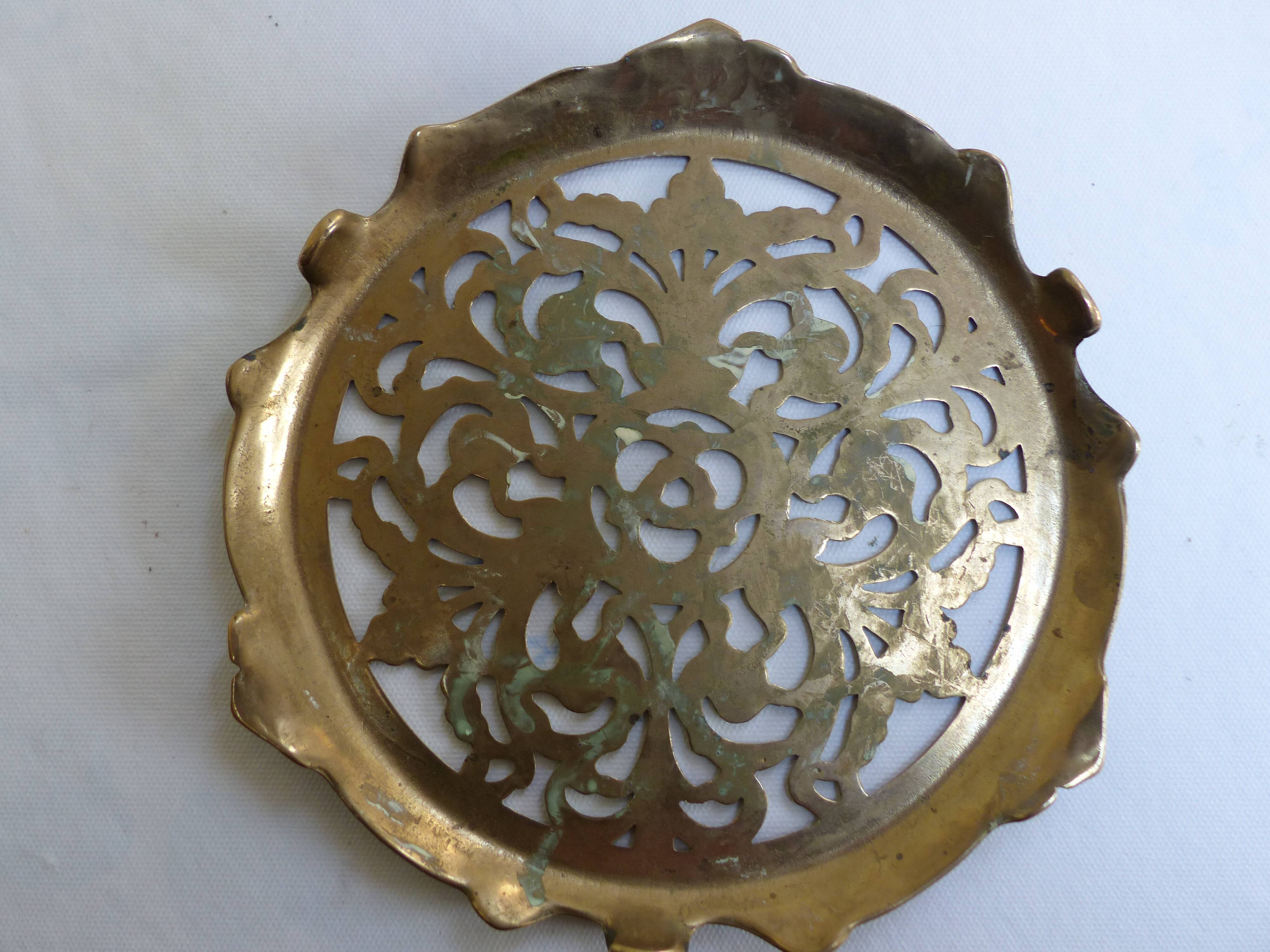 Worked copper trivet