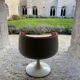 Two cognac-colored swivel chairs made of fiberglass from the 1970s