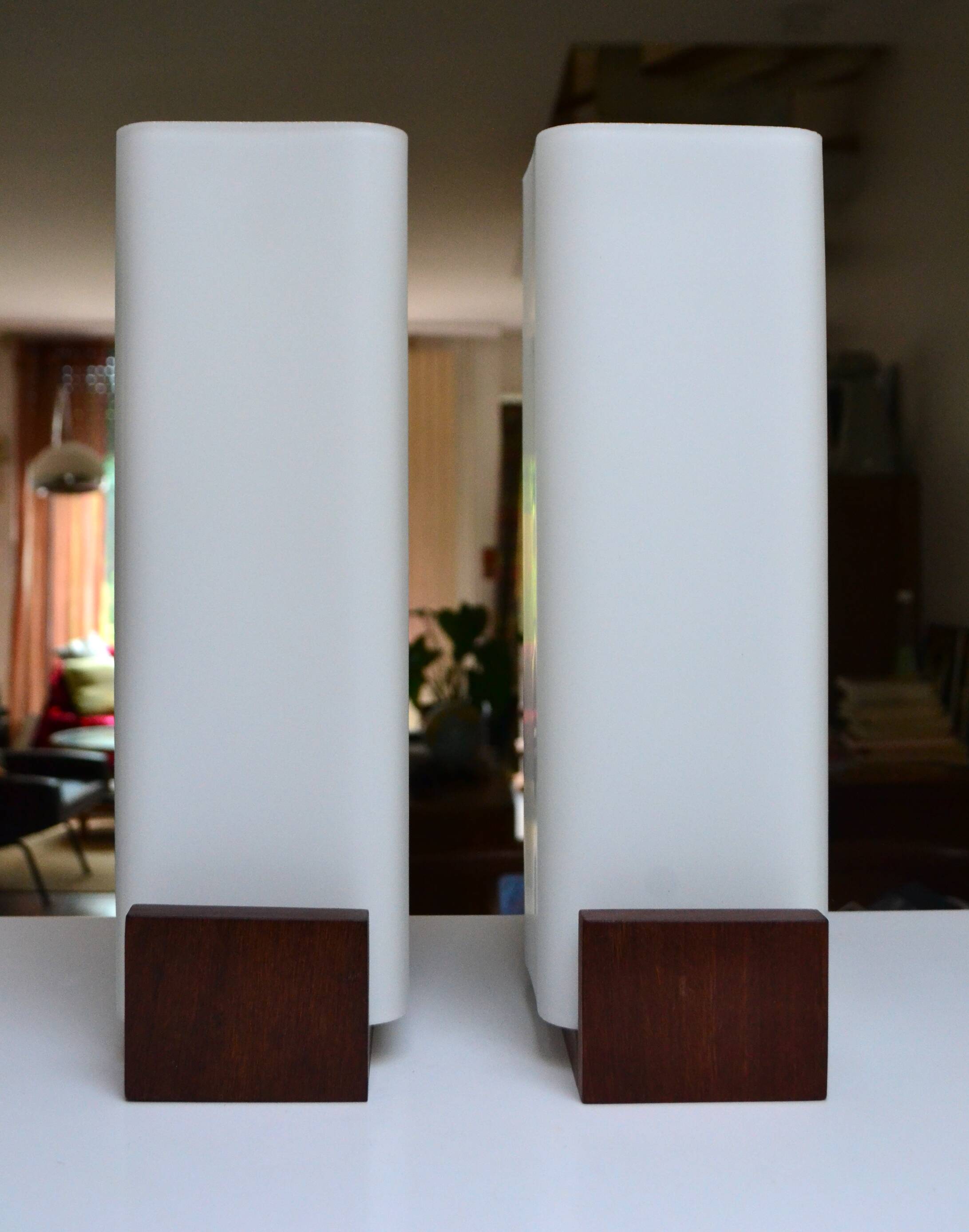 Pair of Louis Kalff wall lights, teak opalines from the 50s/60s.