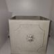 Square planter with patinated iron lion heads