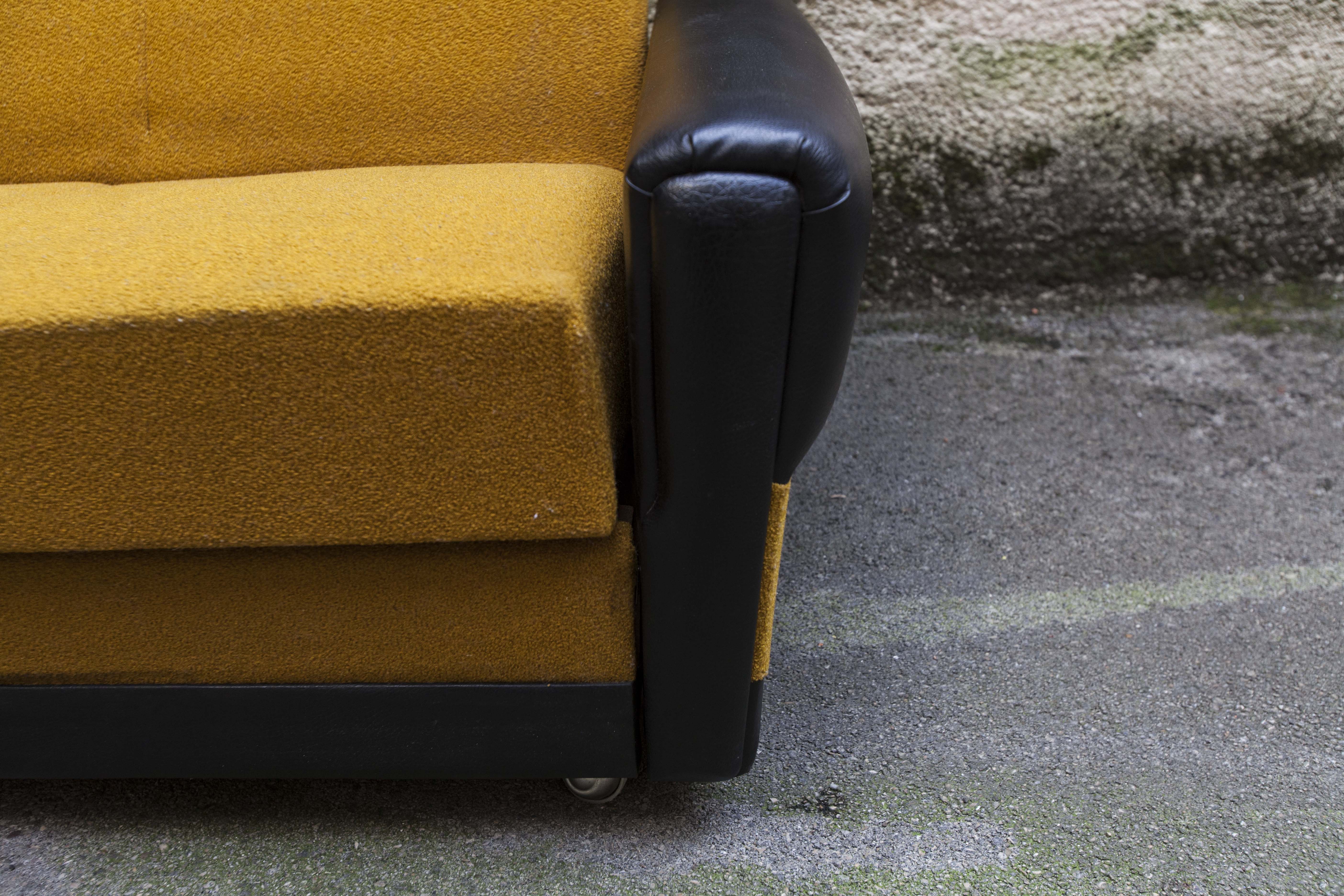 The 1970s gold and black Daybed couch