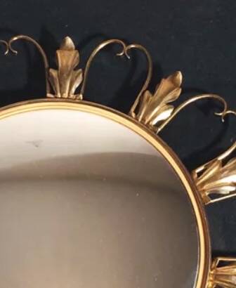 50s “witch’s eye” sun mirror. deknudt hollywood regency