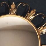 50s “witch’s eye” sun mirror. deknudt hollywood regency