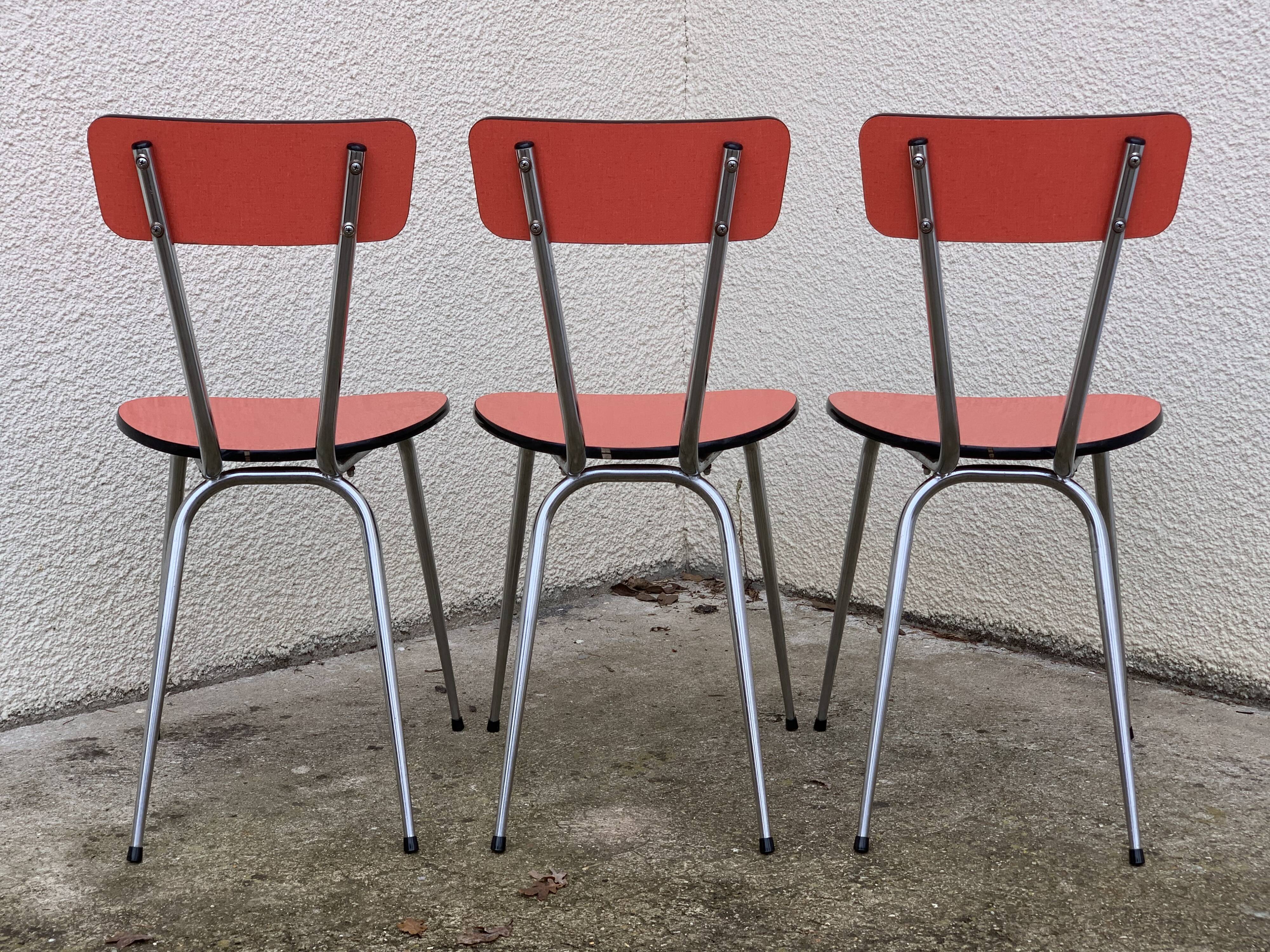 Red formica chairs 1950