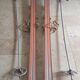 Old skis wooden and its pair of sticks