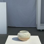 Small white ball vase tight neck in glazed speckled ceramic