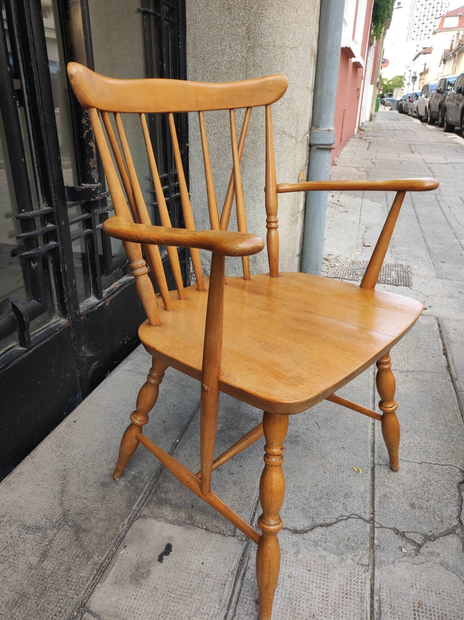 Four chairs and a Heywood Wakefield Windsor armchair. Vintage