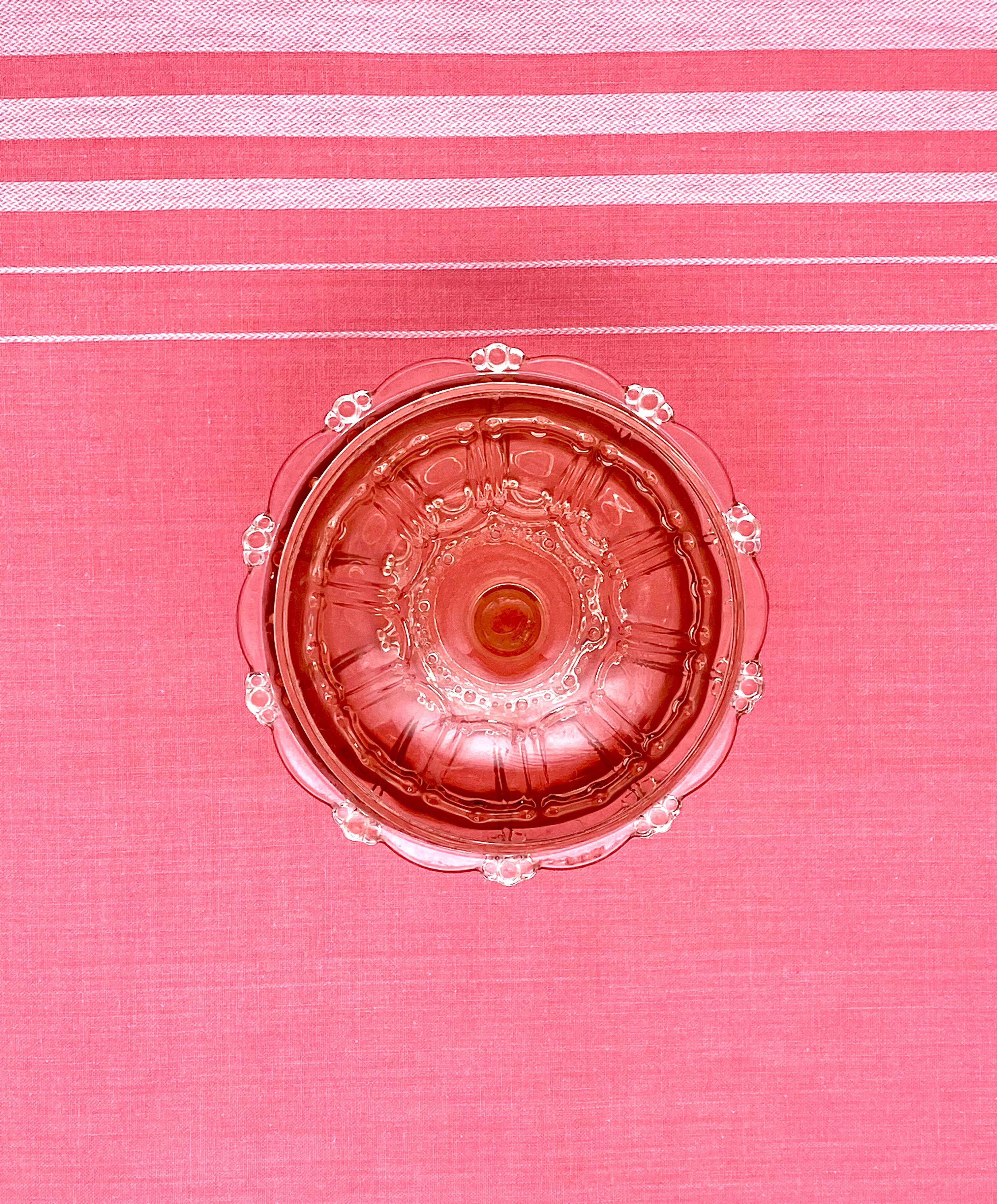 Sugar pot in worked pink glass