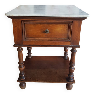 Old wooden marble bedside table