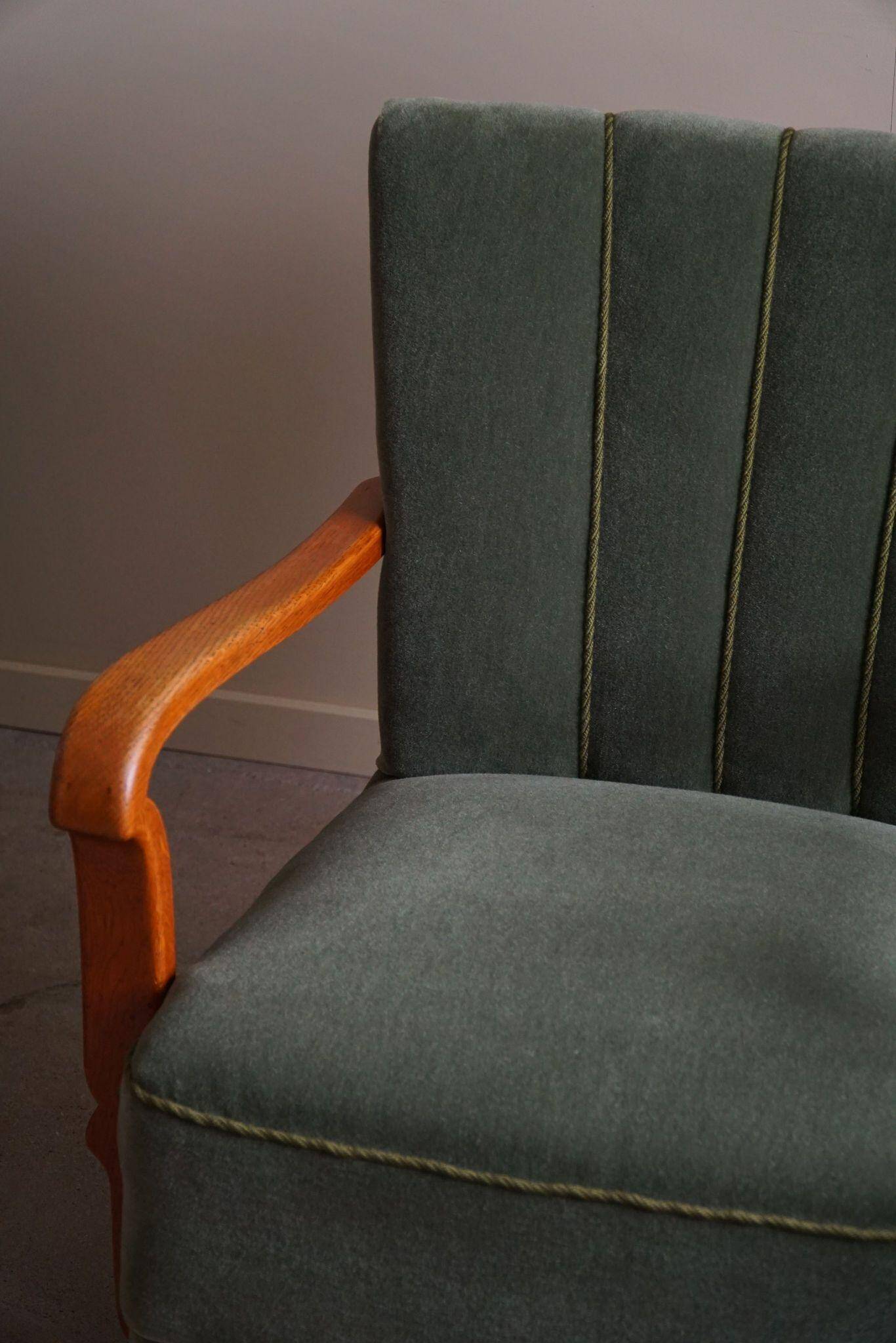 Danish Art Deco, set of 3 oak armchairs, reupholstered in green mohair, 1930s.