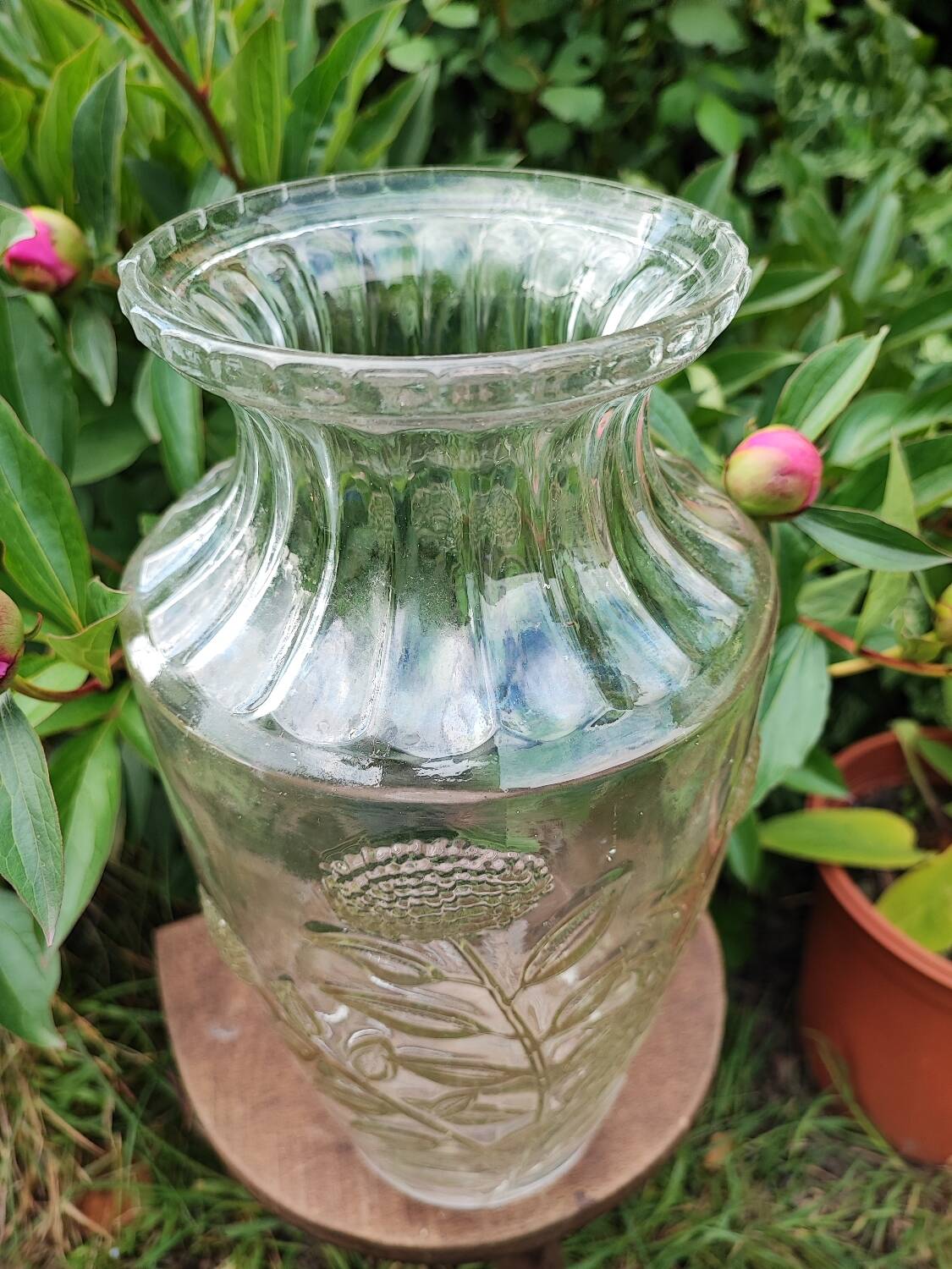 Old large molded glass vase with thistle decoration
