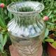 Old large molded glass vase with thistle decoration