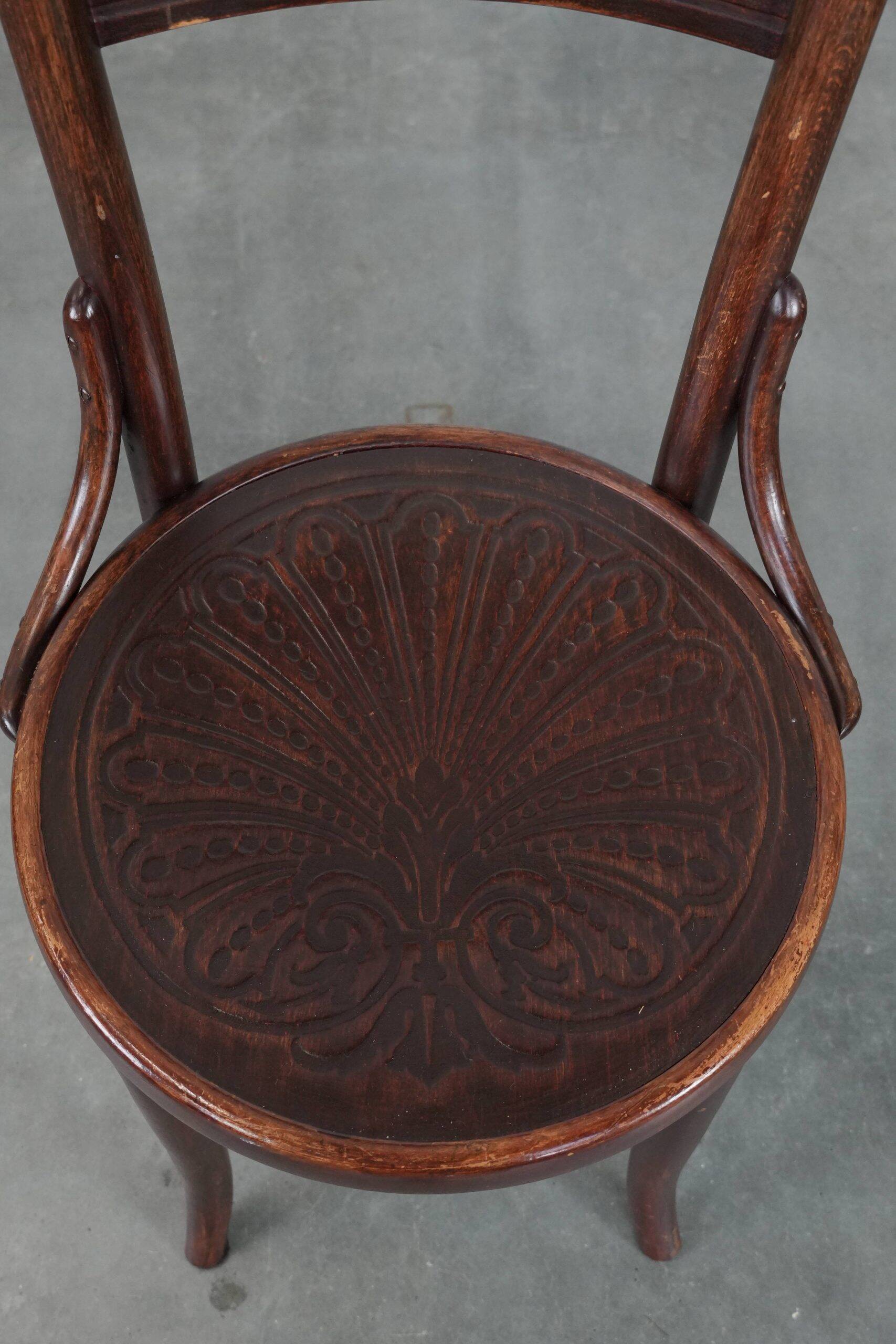 Set of five vintage wooden Cosmos bistro design chairs with stunning detail