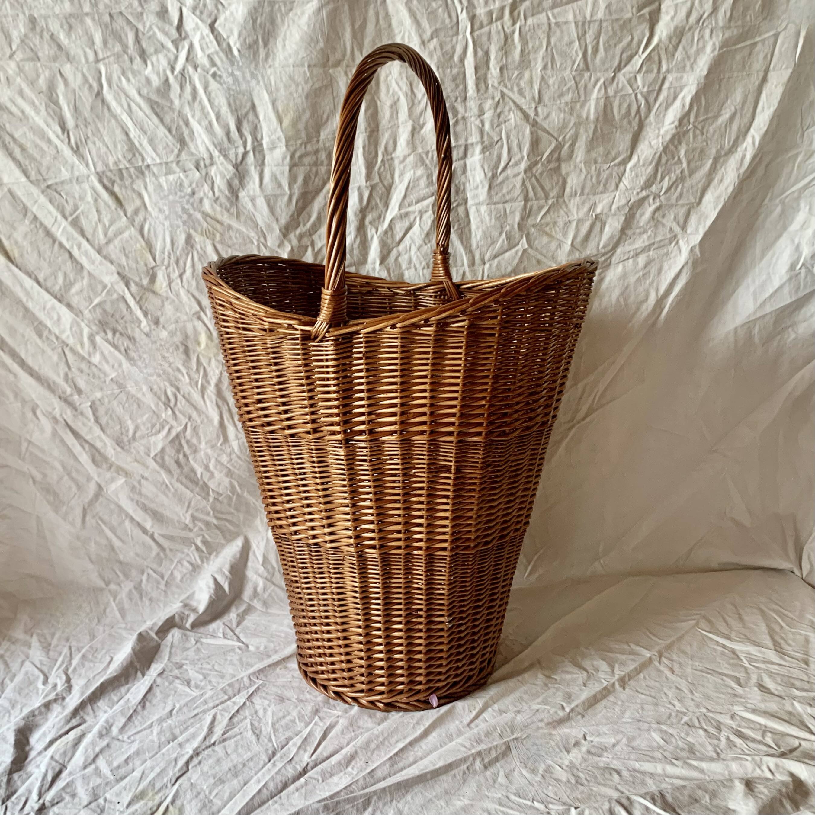 Old woven wicker umbrella stand