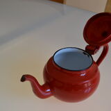 Vintage tea in red and black enamelled sheet