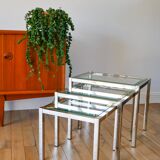 Set of three nesting coffee tables, gilt brass with beveled glass tops, 1980