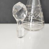 Crystal bottle with silver metal neck rim