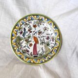 Decorative plate with medieval, Breton and rabbit decoration surrounded by plants - Breton earthenware