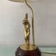 Vintage Peris Andreu lamp in bronze and wood from the 1970s.