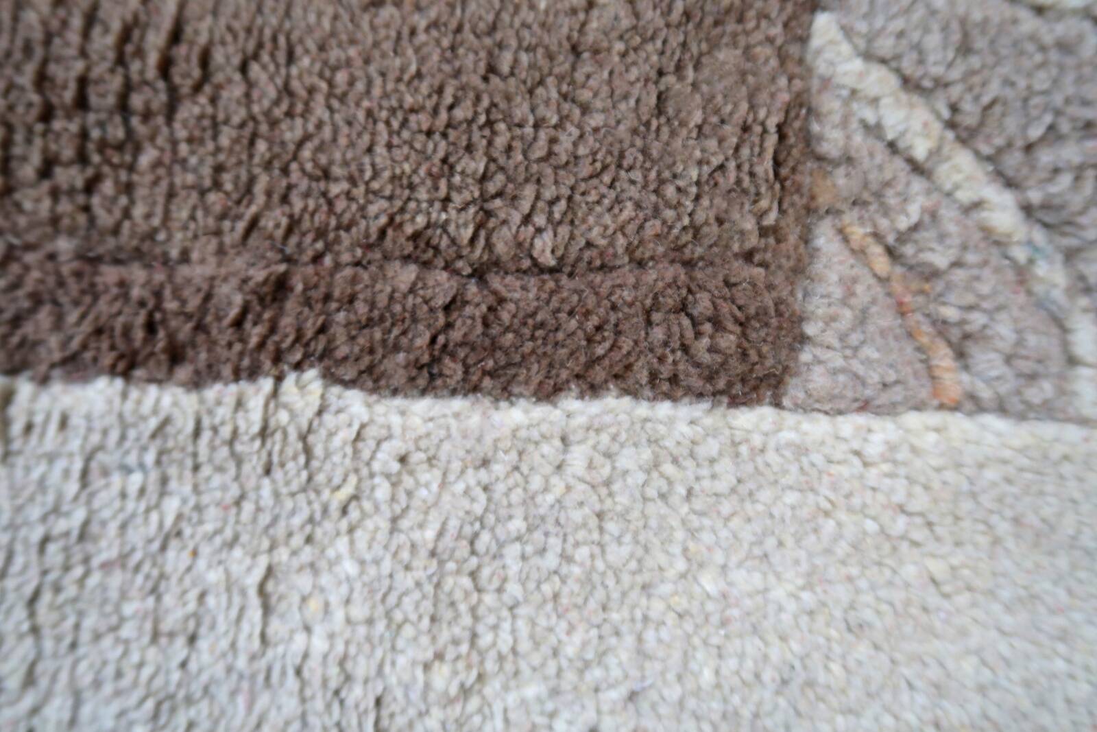 Tapis vintage tibétain Khaden fait main en laine – 64 x 124 cm  Années 1970